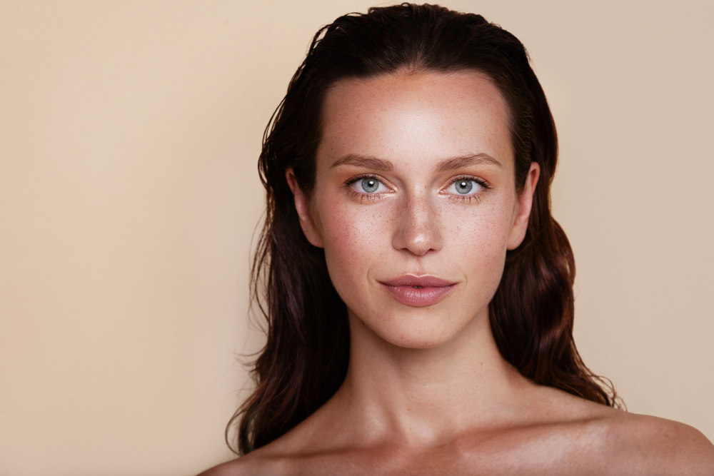 Woman with glowing skin after a medspa facial treatment.